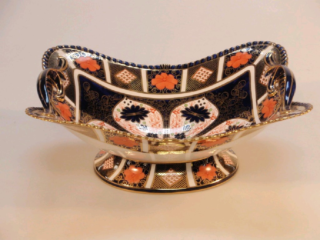 Appraisal: A Royal Crown Derby Old Imari two-handled boat shape pedestal