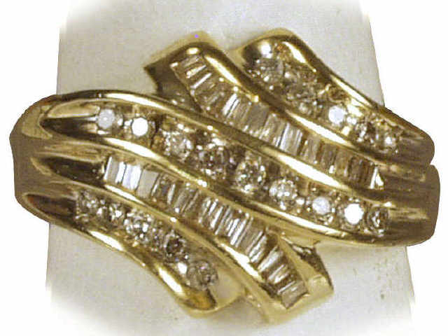 Appraisal: Dazzling ladies karat yellow gold ring channel set with approx