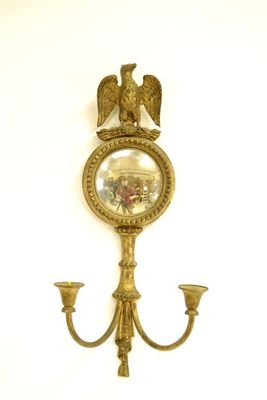 Appraisal: A French gilt brass two branch wall light having a