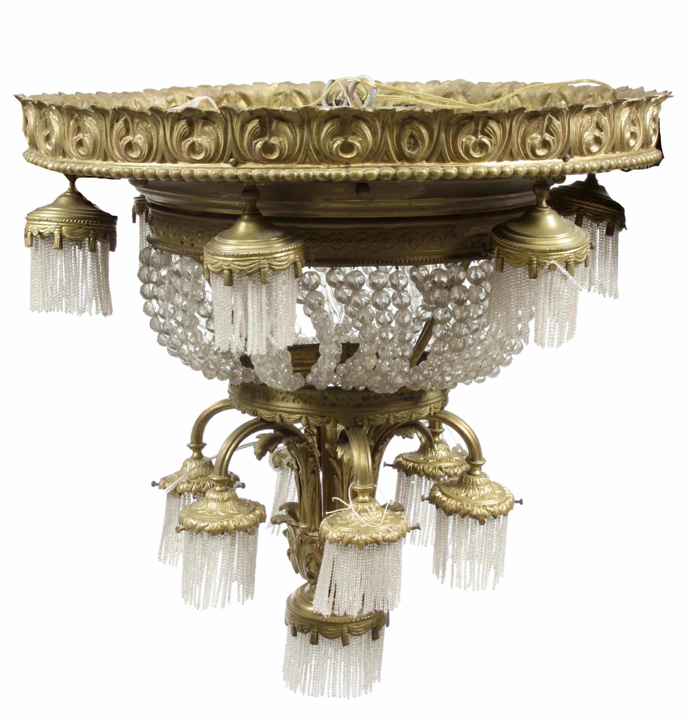 Appraisal: A Beaux Arts gilt bronze and glass thirteen light chandelier