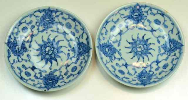 Appraisal: Pr Chinese Qing Porcelain DishesFinely painted to depict lotus blossoms