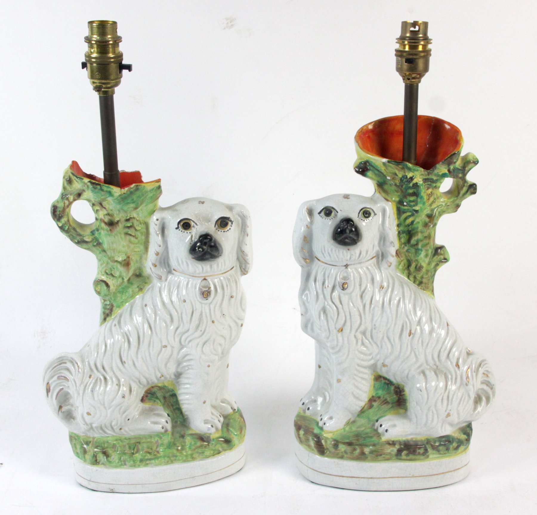 Appraisal: A pair of Staffordshire dogs now converted as lamps cm