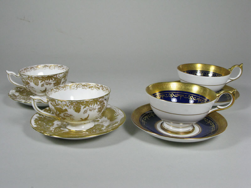 Appraisal: Group of Four Bone China Teacups Saucers two being Royal