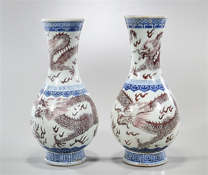 Appraisal: Pair of Chinese red blue and white porcelain dragon vases