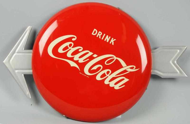 Appraisal: s Coca-Cola Tin Button Arrow Sign With old connecting hardware