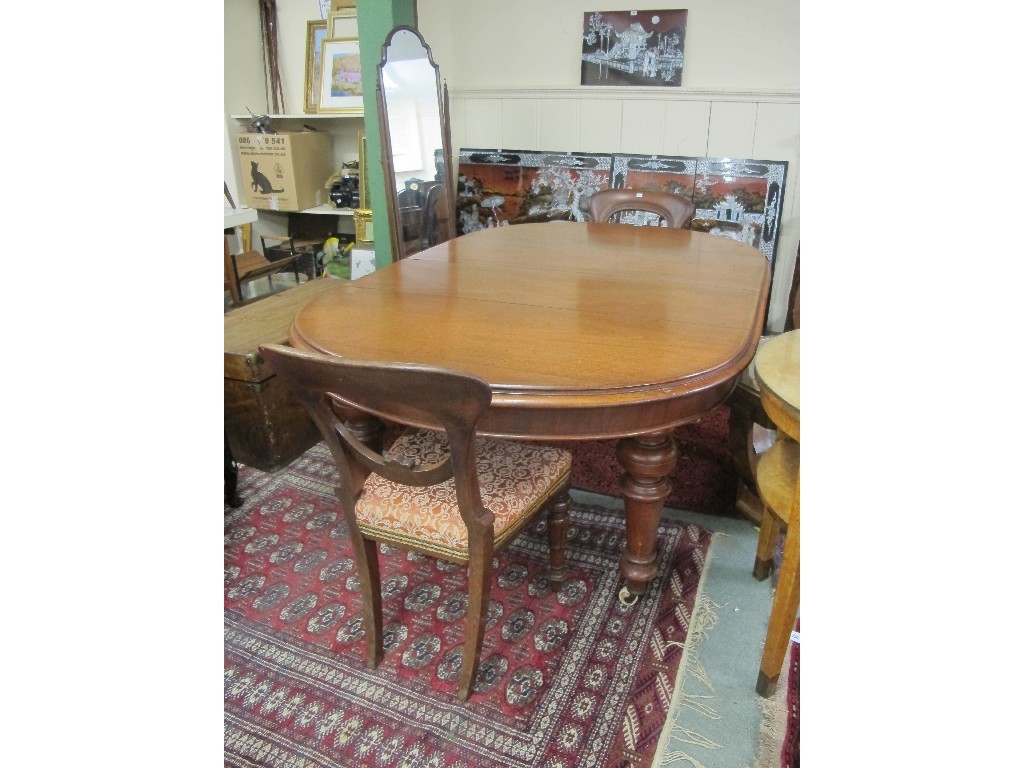 Appraisal: Victorian mahogany D-ended telescope table with two Victorian mahogany dining