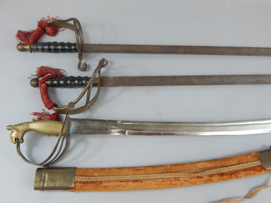 Appraisal: Three reproduction brass and metal swords