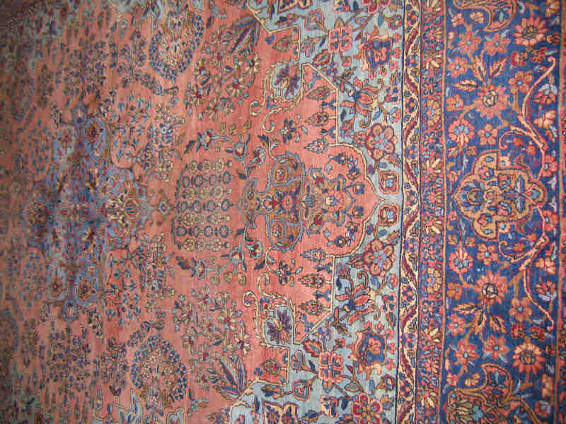 Appraisal: EARLY TH CENTURY PERSIAN KIRMAN ROOM RUG The salmon field