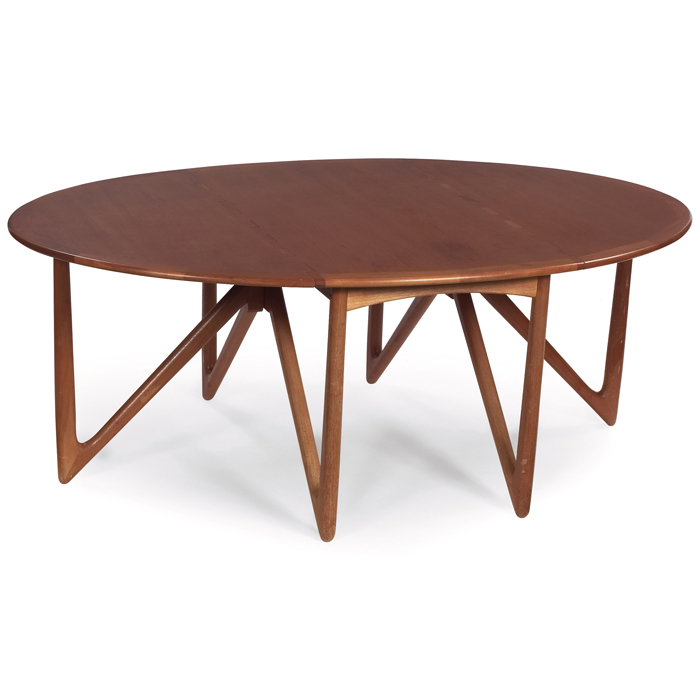 Appraisal: Danish Modern drop-leaf dining table teak six V-shaped supports finger