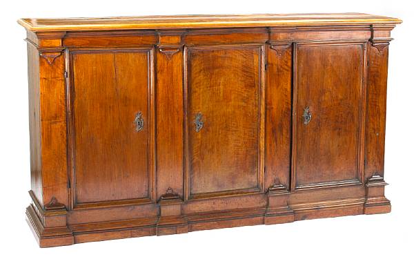 Appraisal: A Northern Italian Baroque walnut credenza late th century The