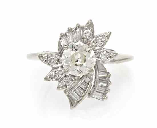 Appraisal: A White Gold and Diamond Cluster Ring containing one round