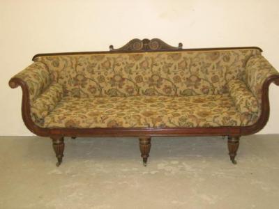 Appraisal: A REGENCY MAHOGANY FRAMED SOFA upholstered in a foliate tapestry