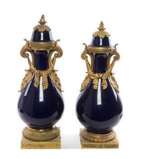 Appraisal: A Pair of Sevres Style Gilt Bronze Mounted Porcelain Vases