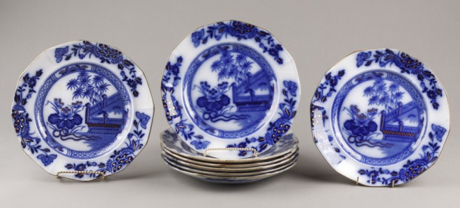 Appraisal: Eight flow blue plates featuring oriental pattern diameter S