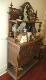 Appraisal: A FRENCH OAK BUFFET The pierced and carved back with