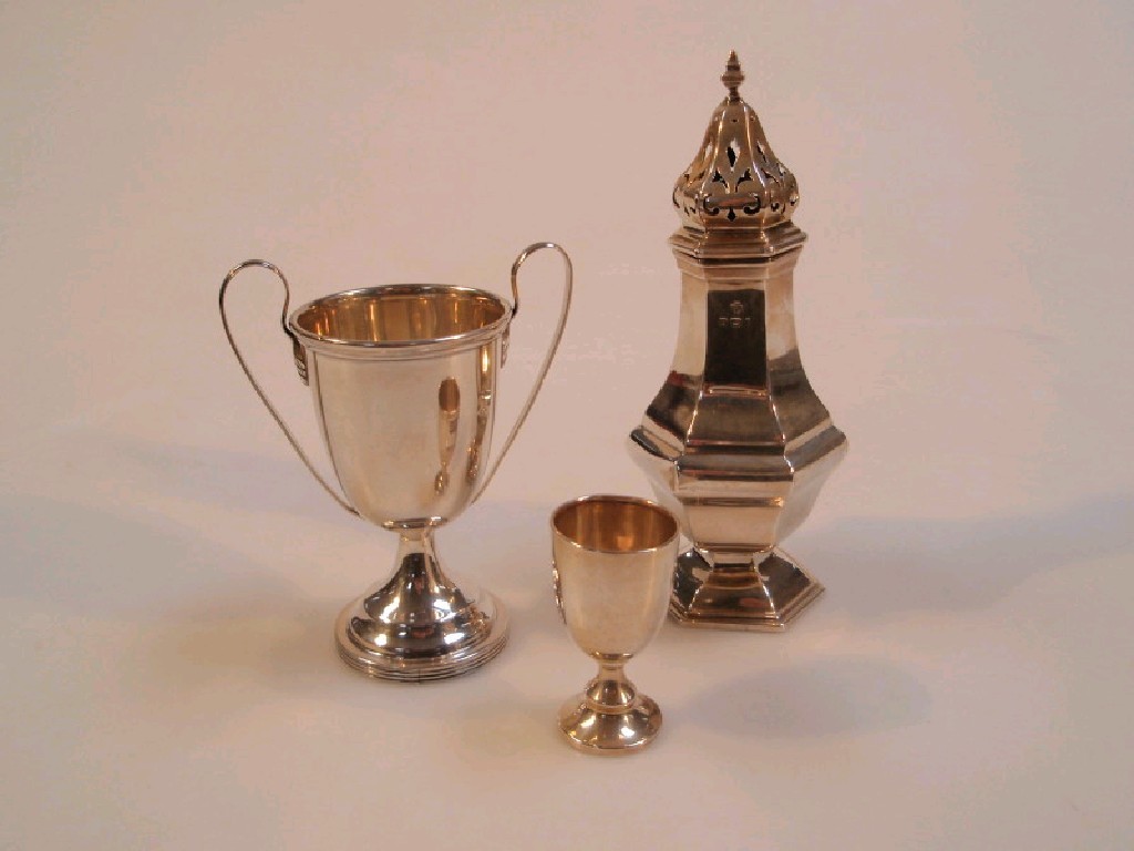 Appraisal: A hexagonal silver sugar castor Birmingham and two silver prize