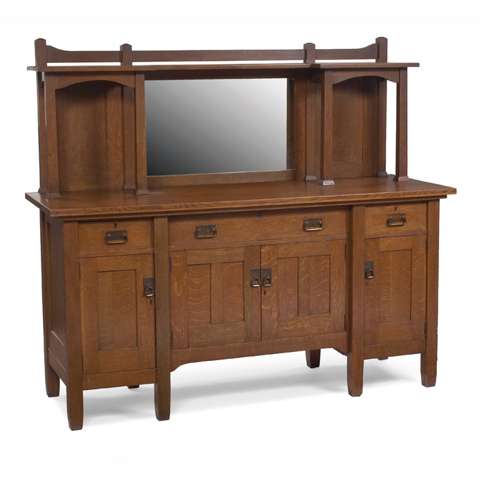 Appraisal: Massive Stickley Brothers sideboard eight-leg form with paneled doors beneath