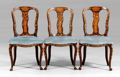 Appraisal: Three Dutch marquetry side chairs each with extensive inlays on