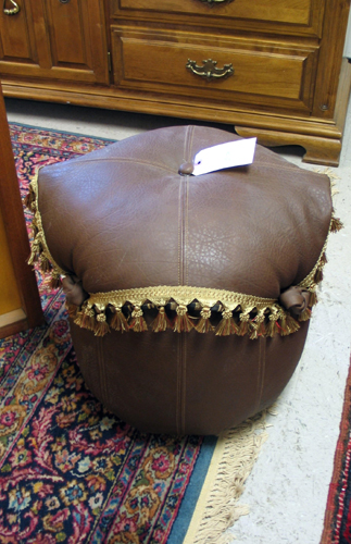 Appraisal: BROWN LEATHER OTTOMAN having a tabouret brown leather cushion seat