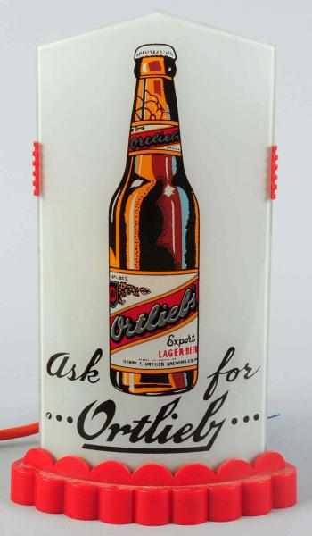 Appraisal: Ortlieb Beer Reverse Glass Light-Up Bullet Sign Very clean glass