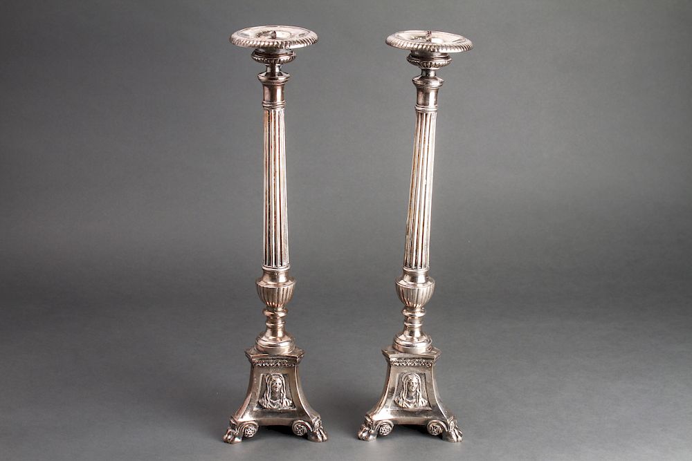 Appraisal: Silver-Plate Ecclesiastical Candlesticks Pair Neoclassical silver-plate ecclesiastical footed candlesticks with