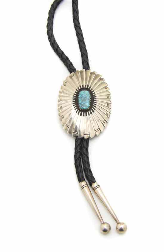 Appraisal: A Navajo Sterling Silver Bolo Harvey Begay having a feather