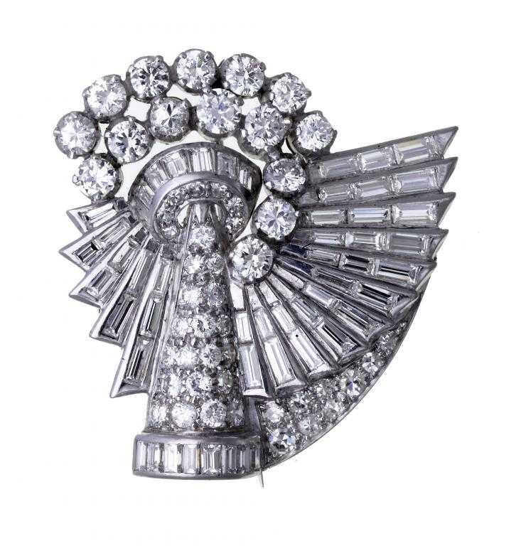 Appraisal: A DIAMOND BROOCH of ruffle design with round brilliant trapeze