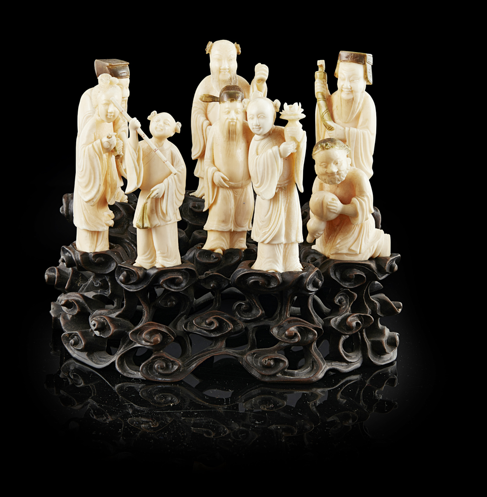 Appraisal: YSET OF CARVED IVORY FIGURES OF THE EIGHT IMMORTALS LATE