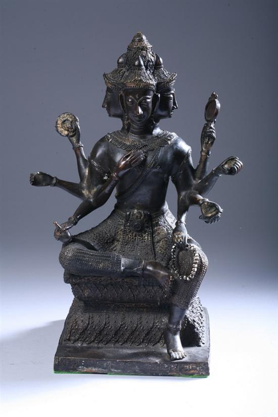 Appraisal: THAI BRONZE FIGURE OF PHRA PHROM Seated on a pedestal