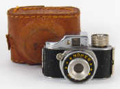 Appraisal: A Homer miniature spy camera in leather case approx x