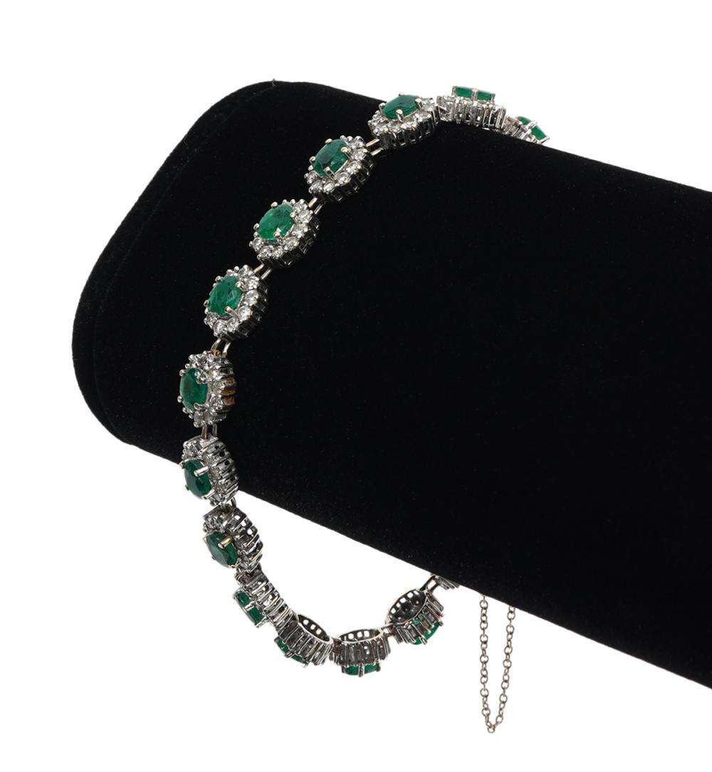 Appraisal: K WG EMERALD AND DIAMOND HALO TENNIS BRACELET K white