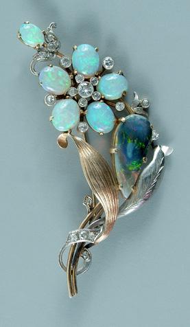 Appraisal: Diamond and opal brooch natural pear-cut black opal estimated weight