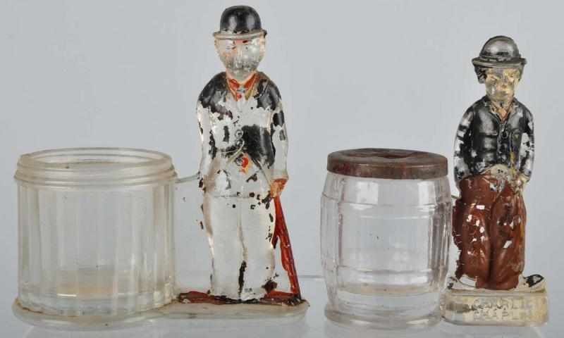 Appraisal: Lot of Glass Charlie Chaplin Candy Containers Description Includes one