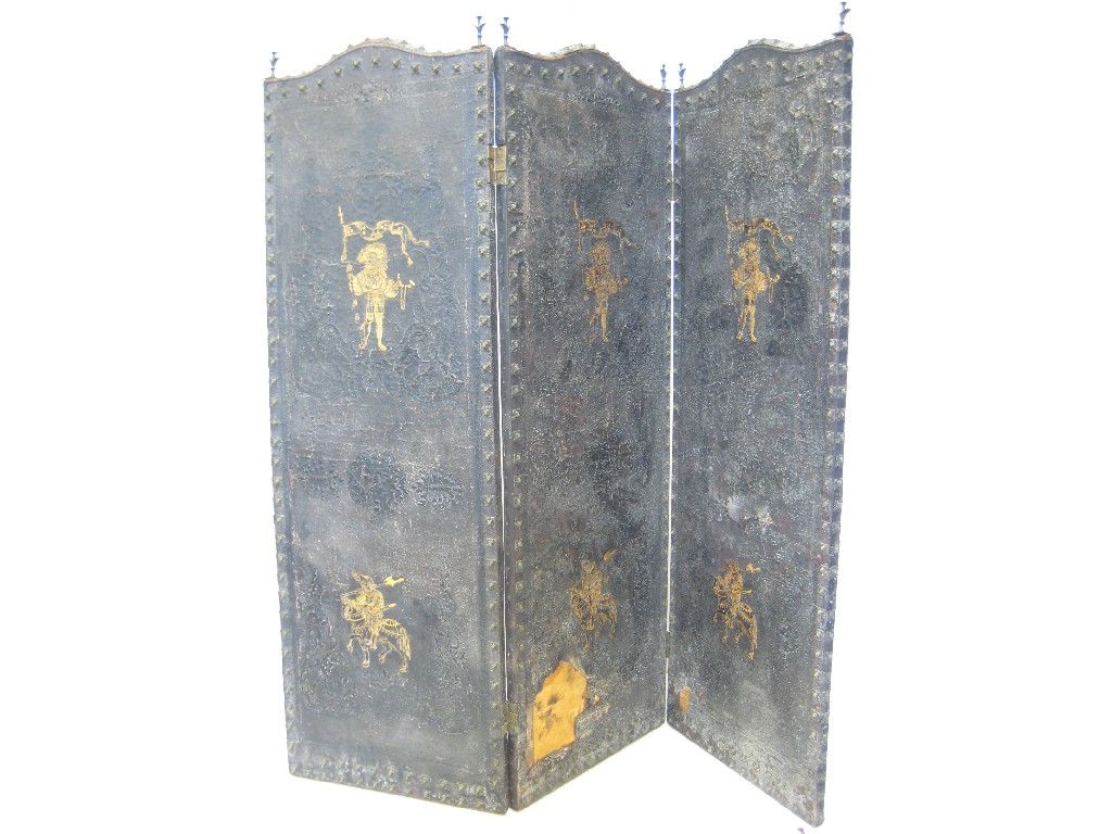 Appraisal: A three fold leather Screen with arched tops leather embossed