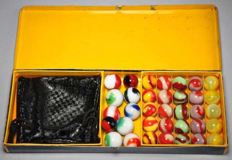 Appraisal: Akro Tin No Box Set of Marbles Description Box contains