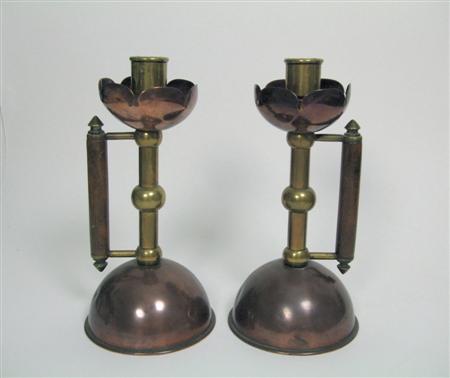 Appraisal: ARTS CRAFTS PAIR OF CHAMBER CANDLESTICKS CIRCA brass copper and