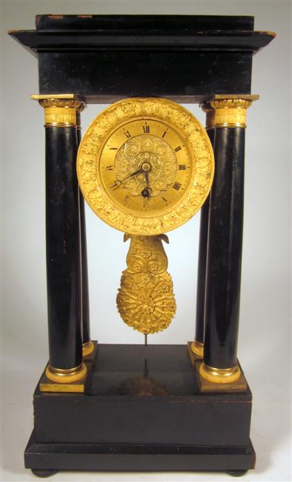 Appraisal: French Empire gilt metal mounted ebonized mantel clock th century