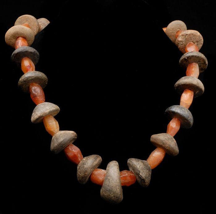 Appraisal: Two Ancient-Style Stone and Clay Bead Necklaces