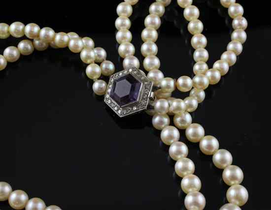 Appraisal: A two strand cultured pearl necklace with amethyst and diamond