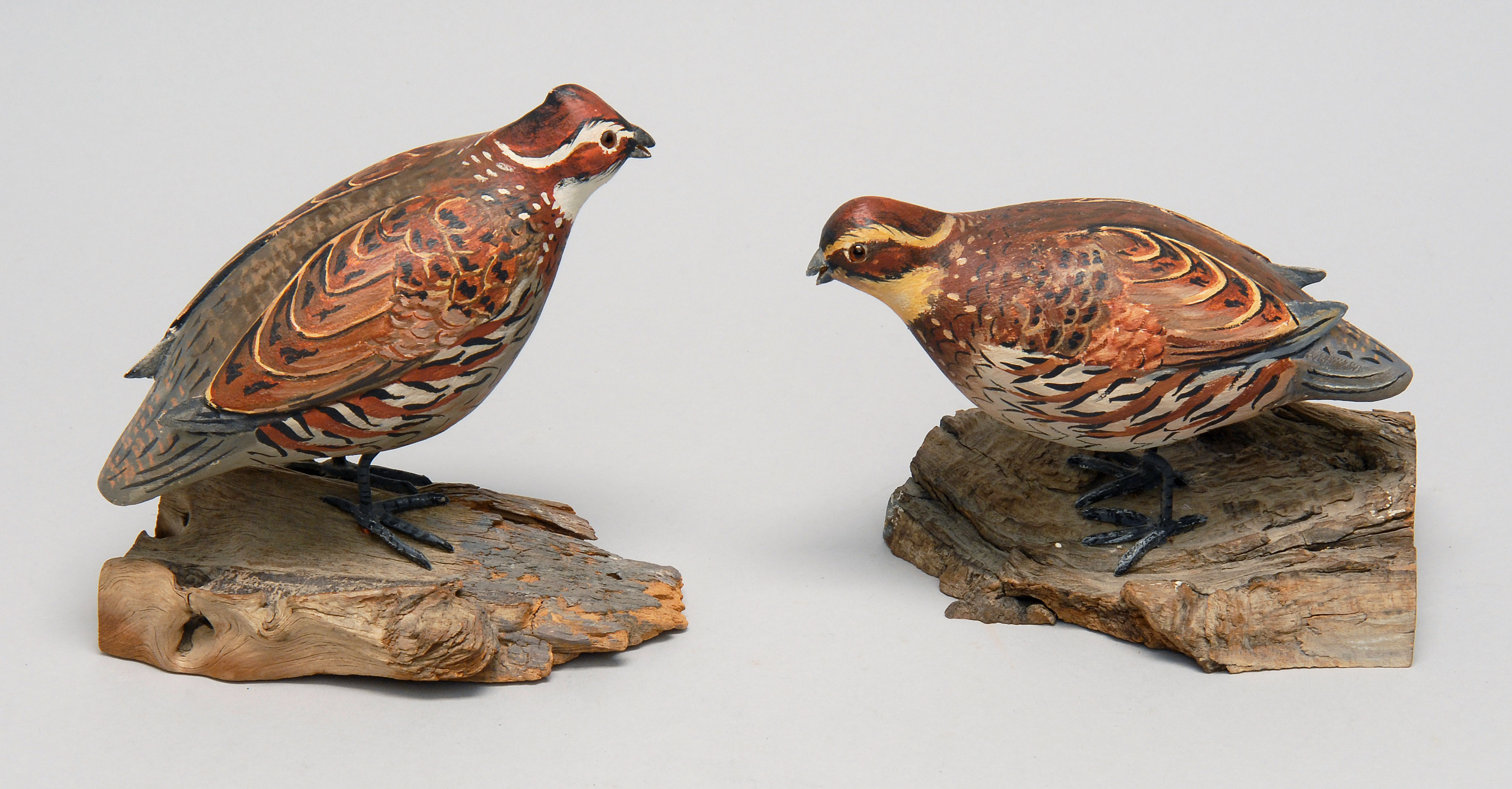 Appraisal: PAIR OF QUAIL CARVINGS By R G Jansson of Cape