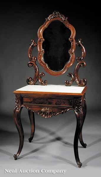 Appraisal: An American Rococo Carved Rosewood Dressing Table mid- th c