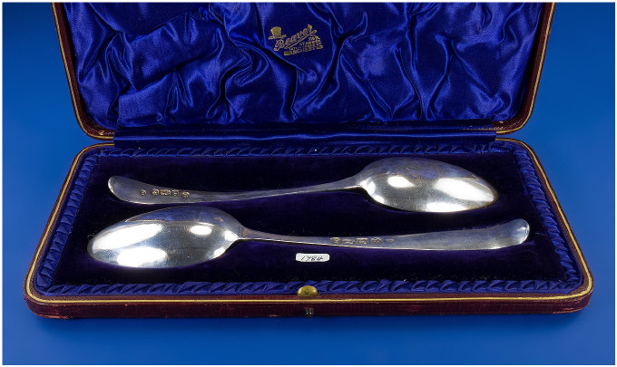 Appraisal: Two Boxed Georgian Tablespoons One is hallmarked for Edinburgh and