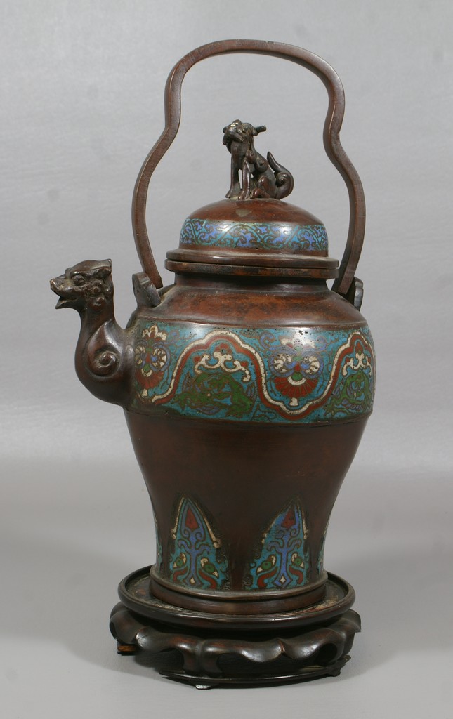 Appraisal: Bronze champlev tea kettle with foodog finial on lid animal