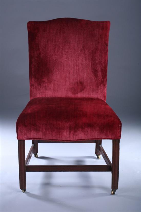 Appraisal: CHIPPENDALE UPHOLSTERED DESK CHAIR th century burgundy velvet upholstery Serpentine