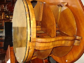 Appraisal: A burr walnut occasional table with glass top including four