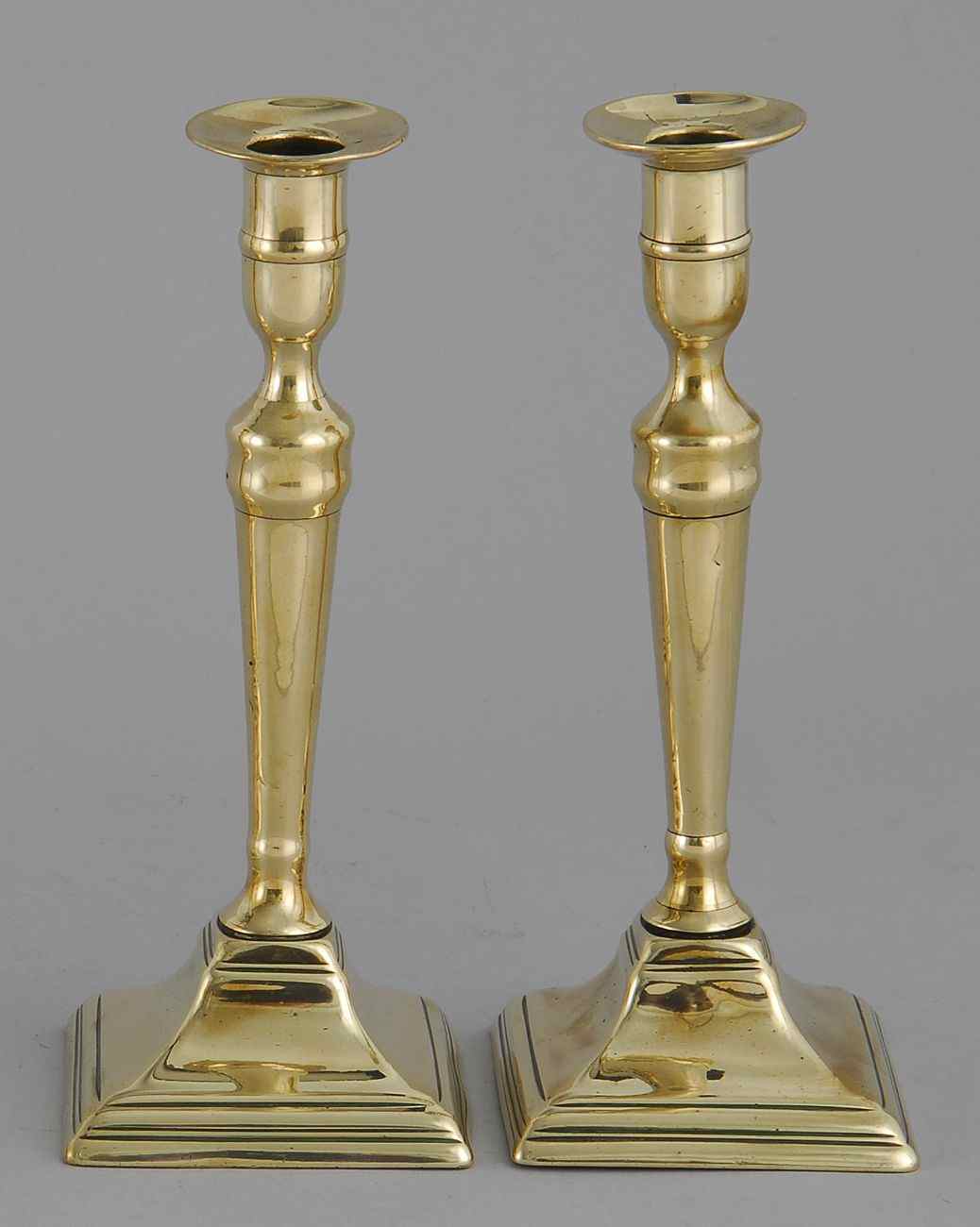 Appraisal: PAIR OF FEDERAL BRASS CANDLESTICKSLate th Early th CenturyFlared bobeches