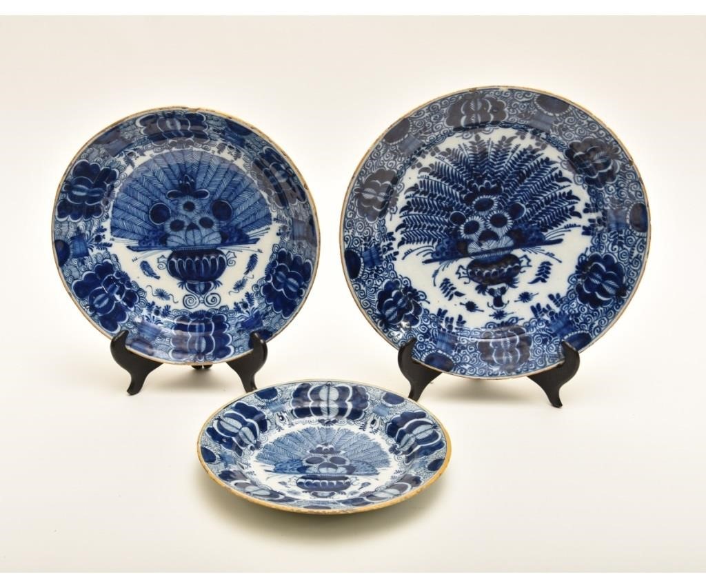 Appraisal: Three deep Delft plates th c Largest dia x h