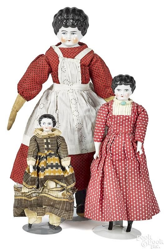 Appraisal: Three China head dolls Three China head dolls all with