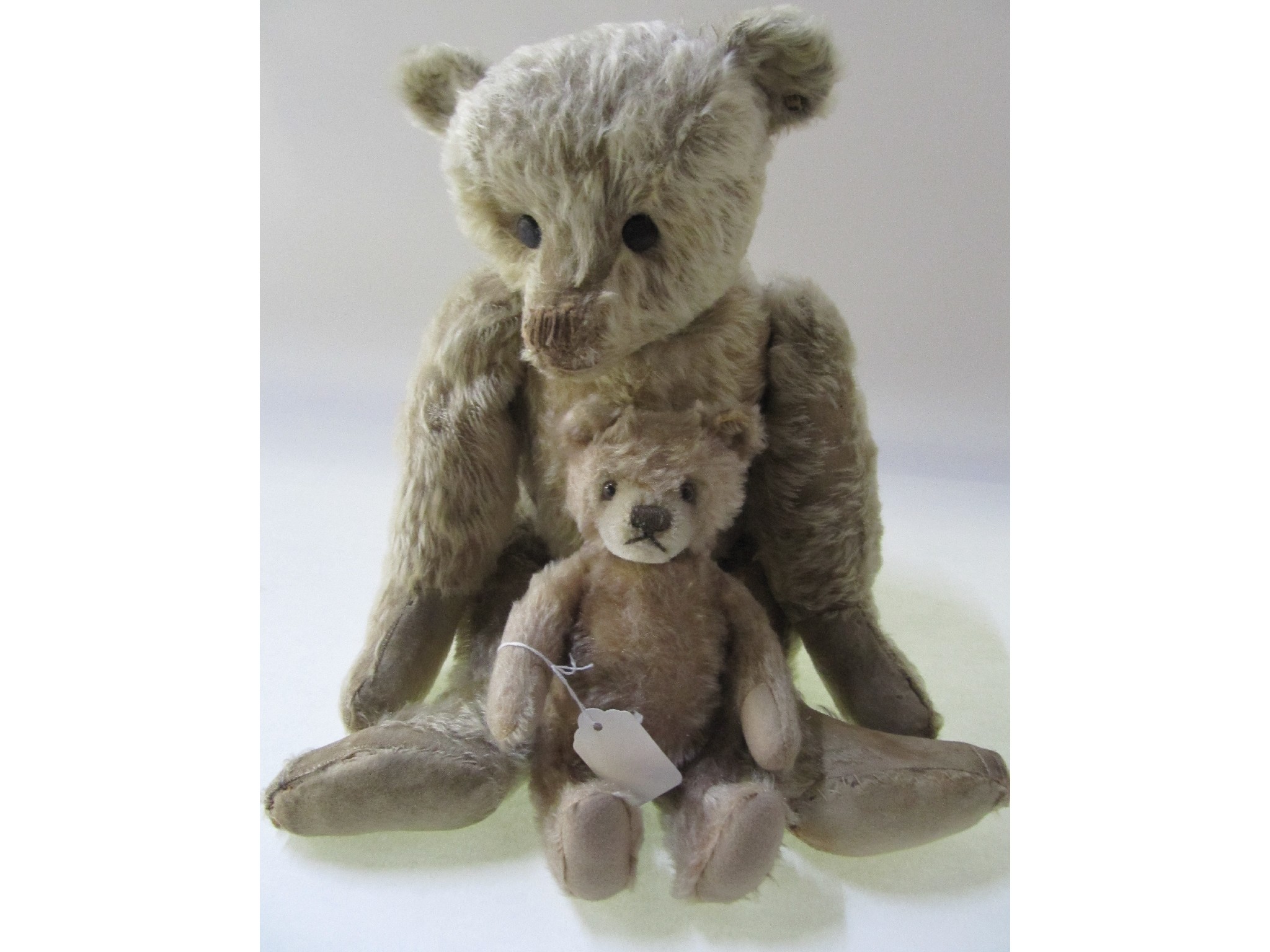 Appraisal: A lot comprising an early th Century teddy bear and