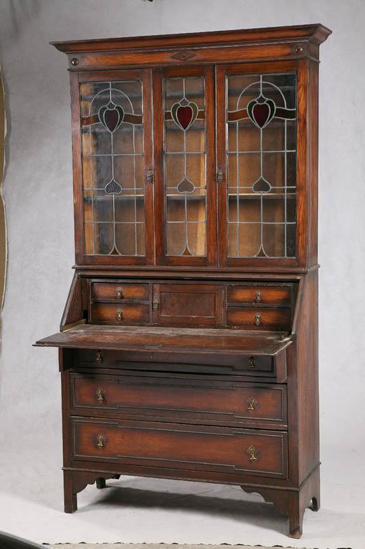 Appraisal: TWO PIECE SECRETARY Oak with three drawers on the bottom